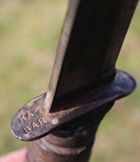 close up view of a ka-bar stamp on union cutlery