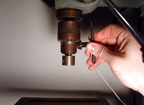 Attaching a roll crimping tool to a drill press is as easy as swapping drill bits. (Photo: Jason Wimbiscus)