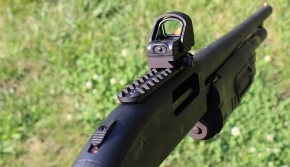 eotech mini red dot sight in action on grass