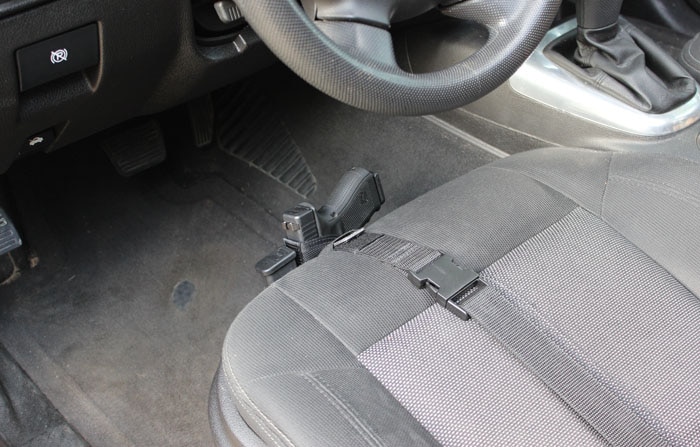 kingston strap gun holster on car seat