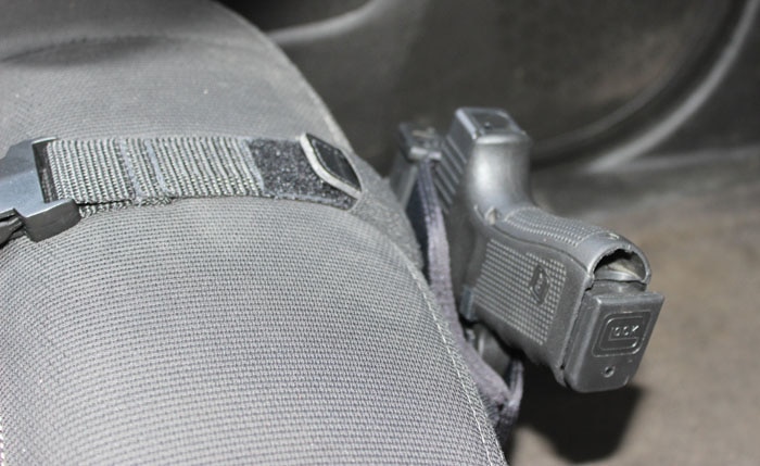 close up view of car seat gun holster