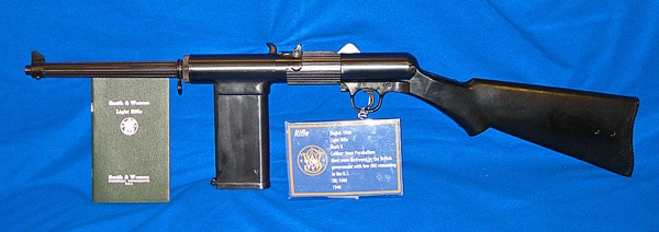 Smith and Wesson 1940 Light Rifle with user manual on blue cloth
