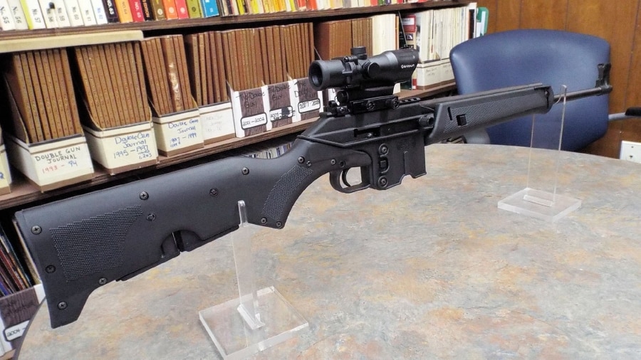 kel-tec su16 rifle on table in library