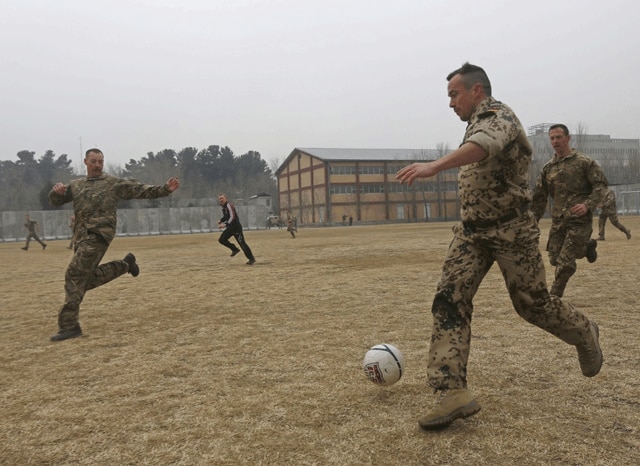 troops-world-war-i-christmas-truce-soccer-commemoration-kabul