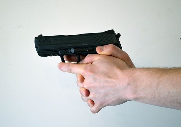 bad-pistol-grip-interwoven-fingers