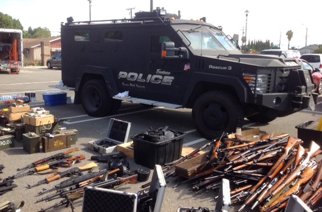 The money shot involved in stumbling across a cache of guns stockpiled by a felon. (Photo: Fontana Police)
