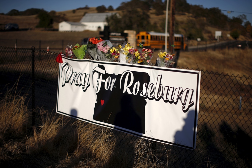 Memorial flowers are seen outside Umpqua Community College in Roseburg, Oregon, United States, October 2, 2015. Lucy Nicholson/Reuters