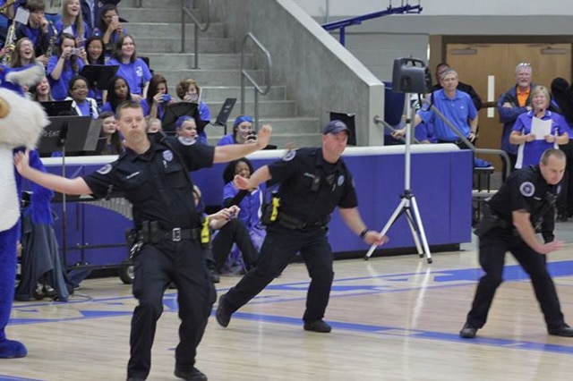 dancing officers