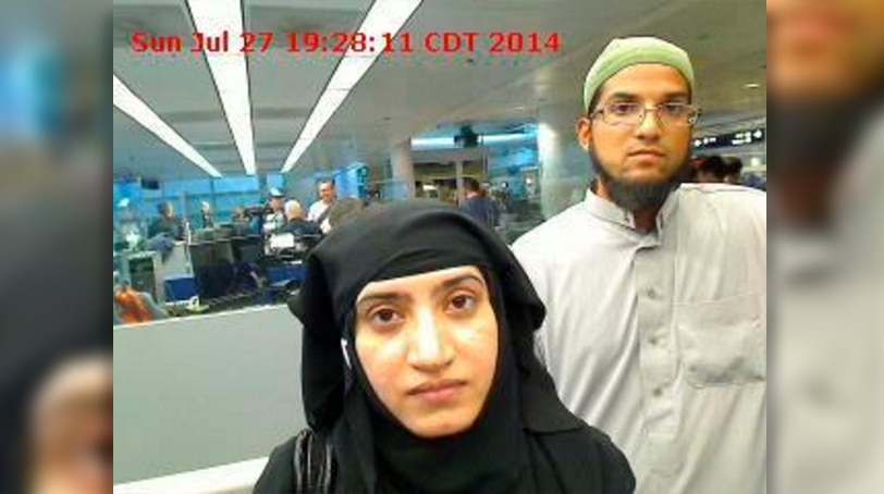 Tashfeen Malik and Syed Farook are pictured passing through Chicago's O'Hare International Airport in July 2014. (Photo: Reuters / US Customs and Border Protection)