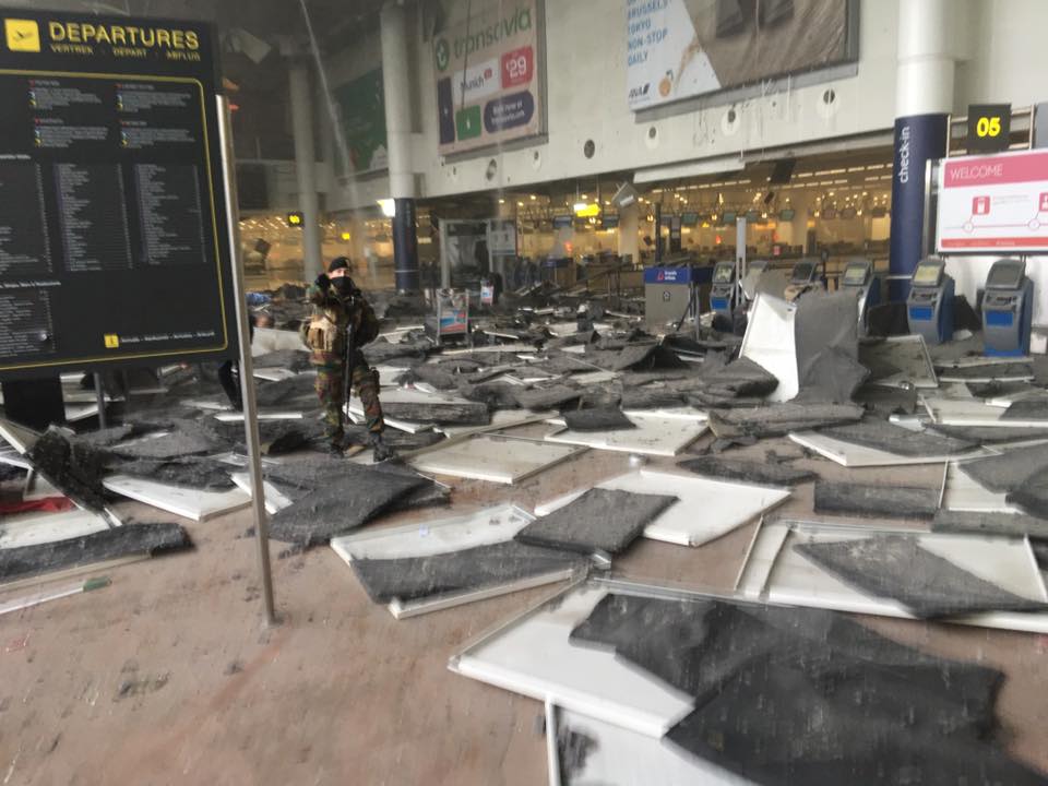 Debris can be seen scattered about after an explosion in Brussels International Airport Tuesday morning. (Photo: Jef Versele / Facebook)