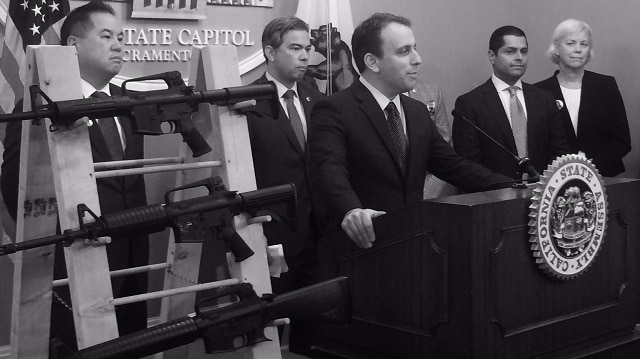 California Assemblymember Marc Levine, with fellow California Democrats -- including Assemblymember Miguel Santiago -- speaking in favor of gun control. (Source: Facebook)