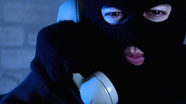 The scammers usually wear masks when they call. 