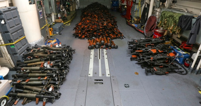 Weapons seized by HMAS Darwin from a small-arms smuggler boarded approximately 170 nautical miles off the coast of Oman on Feb. 27. (Photo: Combined Maritime Forces)