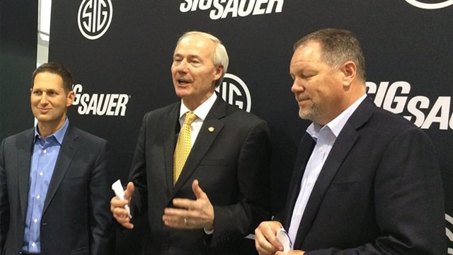Gov. Asa Hutchinson, center, meeting with Sig Sauer at SHOT Show 2016. He's the first Arkansas governor to visit the show. (Photo: Asa Hutchinson/Facebook)