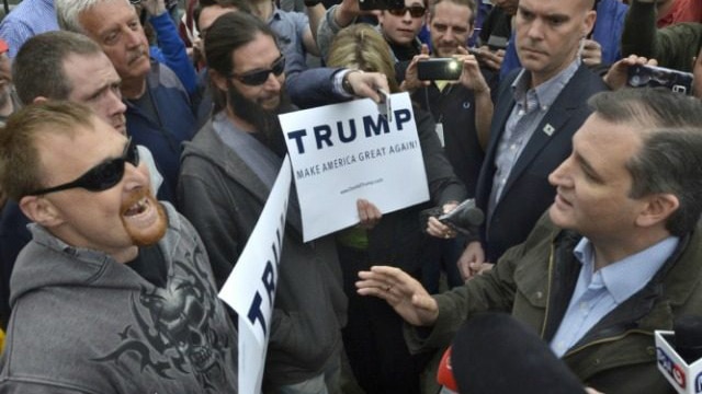 Donald Trump supporter, left, questioning Sen. Ted Cruz's record on Second Amendment issues. (Photo: Associated Press)