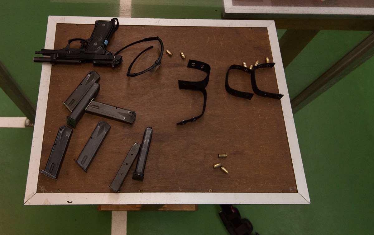 An M9 pistol and magazines on a table as U.S. Army Military Policemen train at a 25-meter firing range on Chièvres Air Base, Belgium, Nov. 14, 2014. (Photo: U.S. Army/Pierre-Etienne Courtejoie)