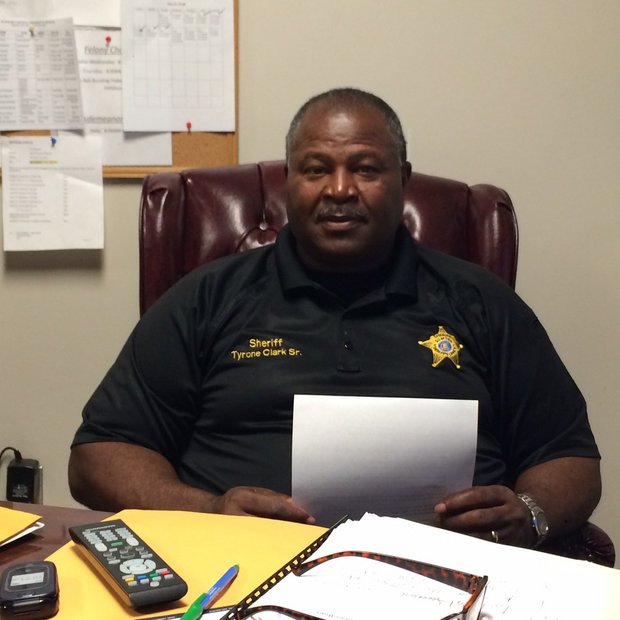 Sumter County Sheriff Tyrone Clark Sr. sits behind his desk at the Sumter County Sheriff's office in March 2016. (Connor Sheets | AL.com) 