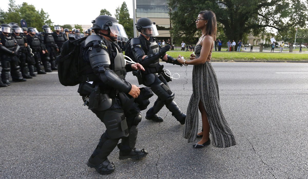Police confront a protester in Baton Rouge this weekend. (Photo: Jonathan Bachman/Reuters)