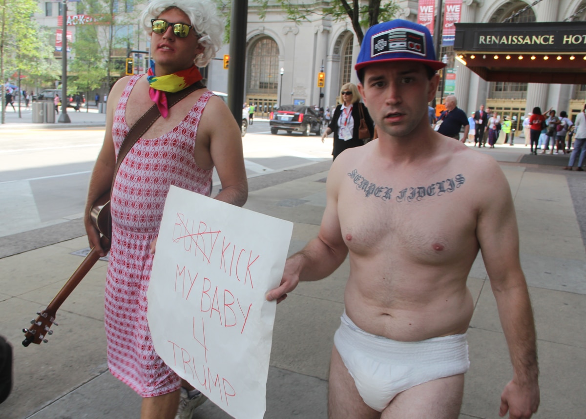 Two men -- one dressed as a mother and the other as a baby -- roamed the sidewalk around Cleveland Public Square. 