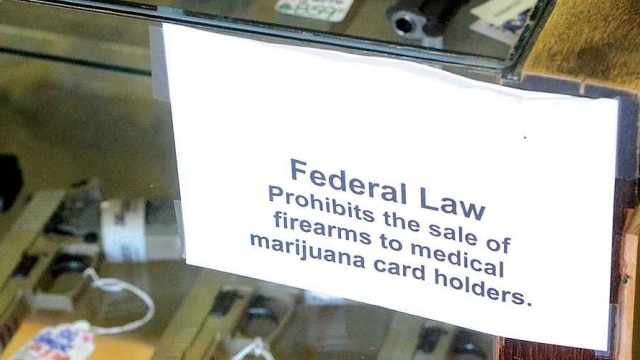An appeals court found this week that there is enough suspicion that a medical marijuana cardholder is a user of illegal drugs that FFLs should continue to deny gun sales to them. (Photo: nwmjlaw.com) 