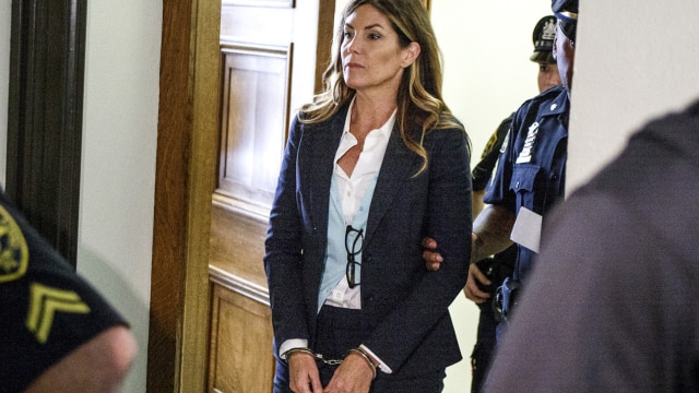 Kathleen Kane is led from the courtroom following sentencing. She was facing up to 24 years in prison, but was given 10 to 23 months and is out on bail pending appeal. (Photo: AP) 