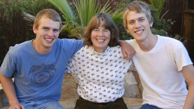 Andrew Wiegardt, left, and Nick Wiegardt pose with their mother, Kirsten Englund, who was killed and set on fire in 2013 by a stranger at a highway rest stop. (Photo: Andrew Wiegardt via AP)