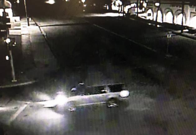 Check out the dark-colored SUV with chrome spoke rims. (Photo: Redland Police Department) 