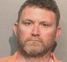 Scott Michael Greene, 46, is suspected of shooting two police officers in the Des Moines area. (Photo: Des Moines Police)