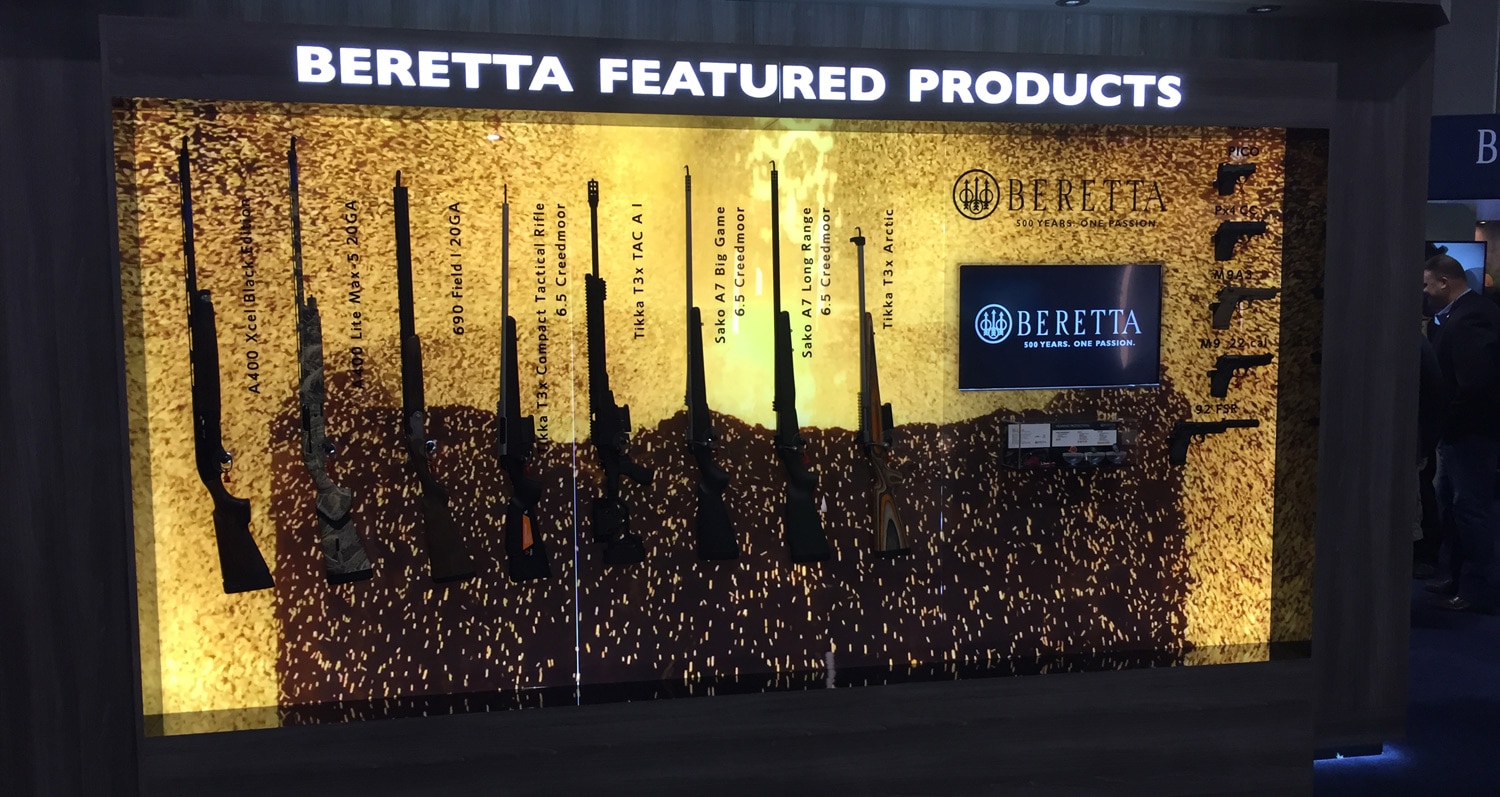 Beretta’s display case that sits outside the booth shows off all the news guns inside. (Photo: Daniel Terrill/Guns.com) 