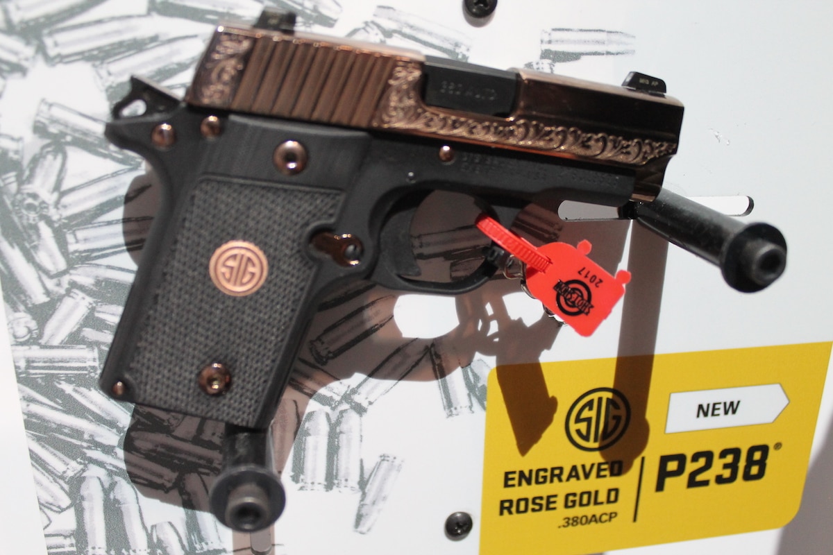 The Sig P239 with an engraved, rose gold slide makes for fashionable concealment. (Photo: Jacki Billings)