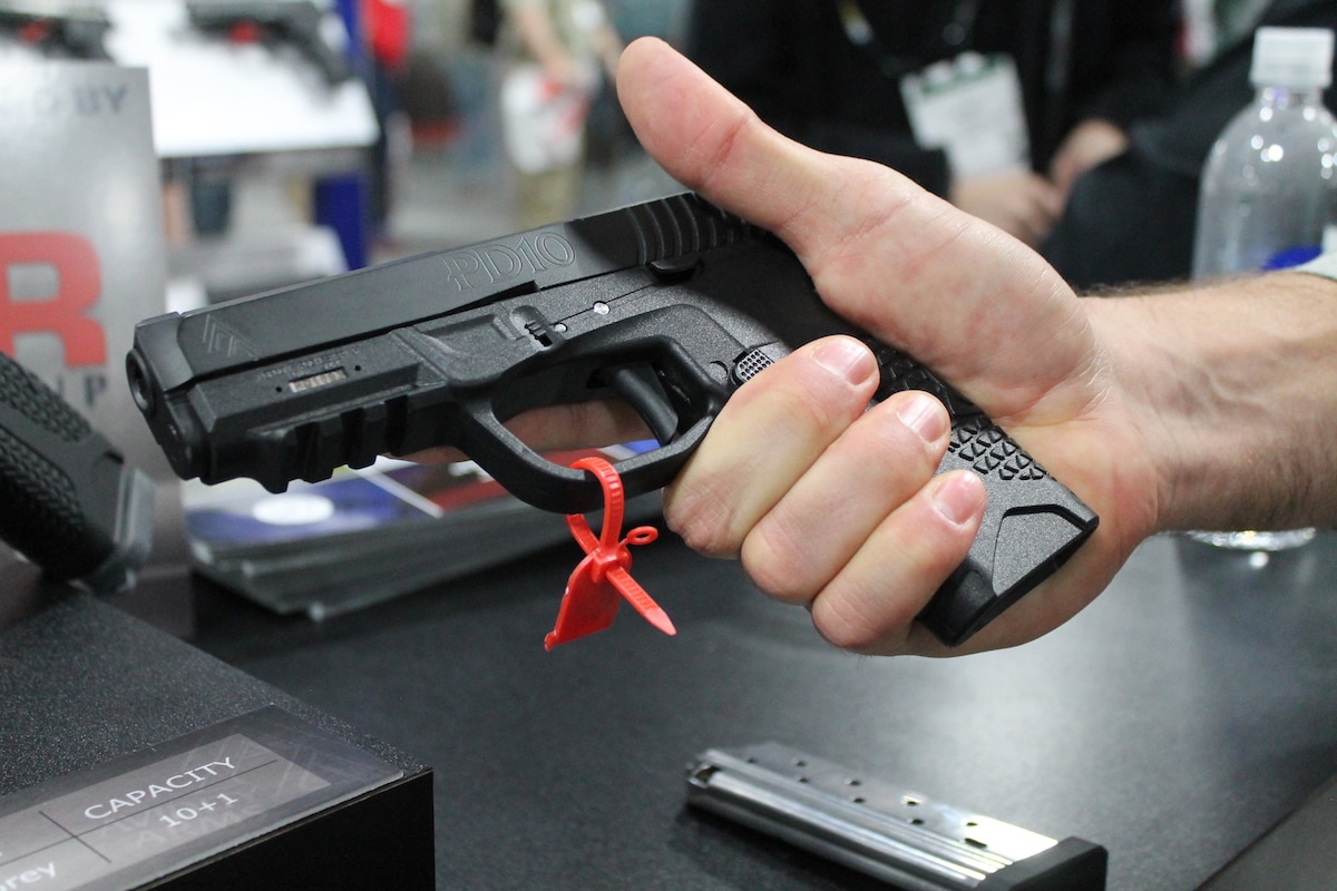 A SHOT Show exhibitor breaks away from his booth to check out the PD10. (Photo: Jacki Billings)