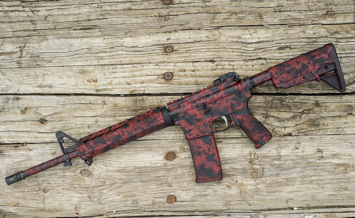 The red and black spatter design is carried all the way through the rifle, down to the custom colored Hexmag magazine. (Photo: XDMAN)
