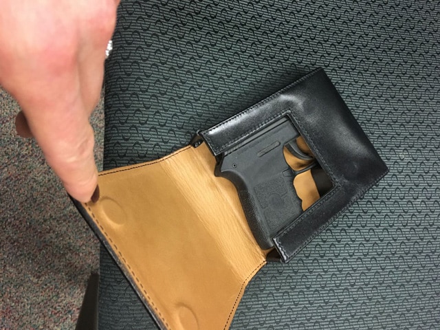 gun in square holster