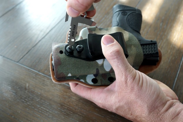 The ARti can be used to adjust holsters on the fly. (Photo: TacWare via Indiegogo)