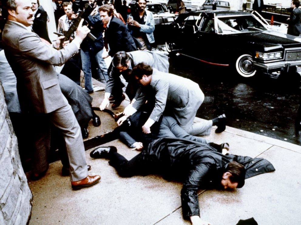 This photo taken by presidential photographer Mike Evens on March 30, 1981 shows police and Secret Service agents reacting during the assassination attempt on then US president Ronald Reagan, after a conference in Washington, D.C. (Photo: Mike Evens/Getty Images)