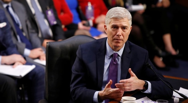U.S. Appeals Court Judge Neil Gorsuch waded through 11 hours of committee hearings on Tuesday. (Photo: Joshua Roberts/Reuters)