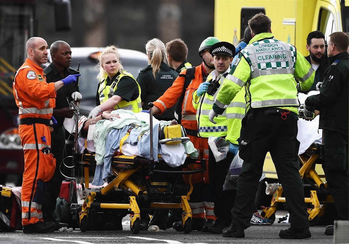Emergency services care for a victim of the London attack near Westminster Bridge and Parliament (Photo: Getty Images)