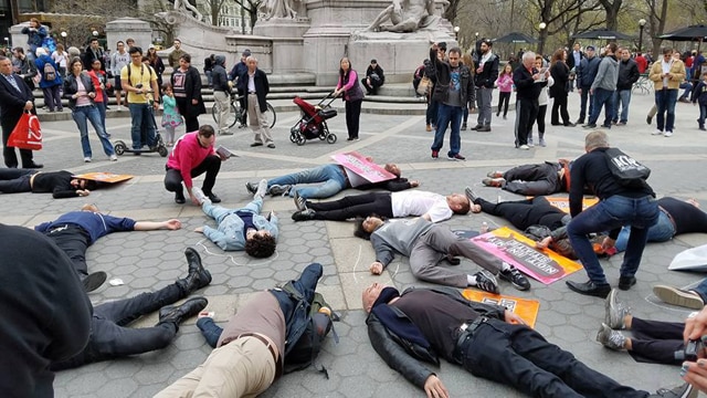 Protestors with the group Gays Against Guns performing during Saturday's anti-Trump tax march in New York. (Photo: GAG/Facebook)