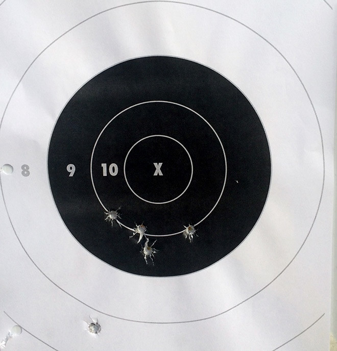 Five_rounds_shot_standing_2C_unsupported_from_25_yards_in_double_action