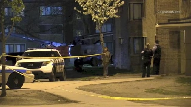 Chicago police work the scene of a fatal shooting in the Parkway Gardens neighborhood. (Photo: Captured News)