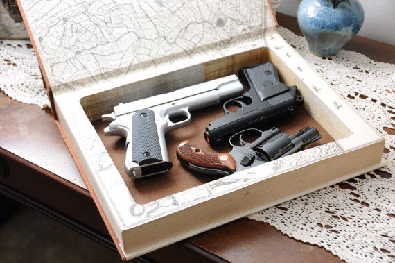 Though storing guns in unsecured books is ill-advised, the gun industry is stepping up to provide gun owners with to distribute guns around the home. (Photo: BookMods via Etsy)