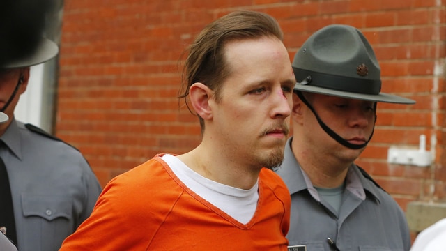 In this file photo, Eric Frein is escorted by police out the Pike County Courthouse after his arraignment in Milford, Pa., Friday Oct. 31, 2014. (Photo:Rich Schultz / AP)