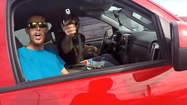 Truck owner points gun at Nevada man on motorcycle (Photo: YouTube)