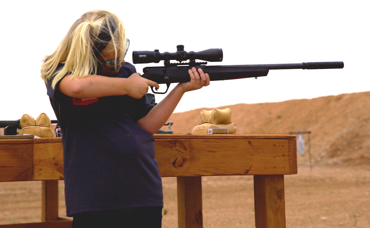 A young shooter tests her targeting skills with a Savage Arms rifle. (Photo: Jacki Billings)