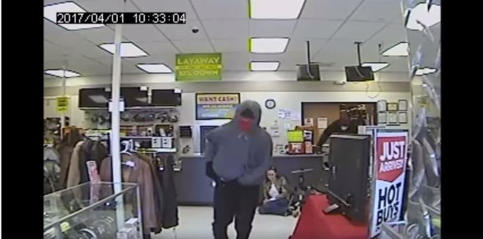 Oklahoma City Police release surveillance video screenshot of one of the suspects in an armed robbery at Fast Cash Pawn on May 22, 2017. (Photo: NBC 4 News)
