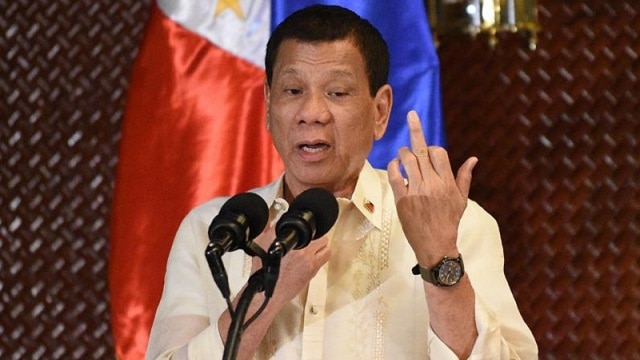 Philippine President Rodrigo Duterte raises his middle finger during an address to military personel on July 18, 2017. (Photo: Getty Images)