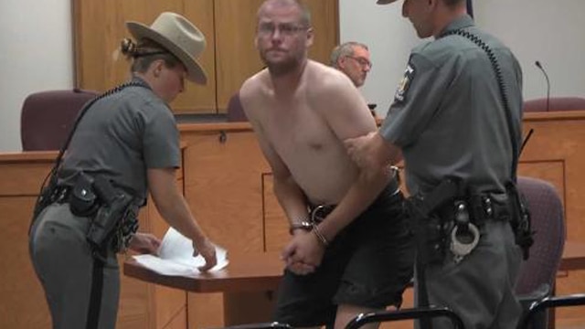 Justin Walters being aided in court by New York State Troopers on July 10, 2017. (Photo: WWNY)