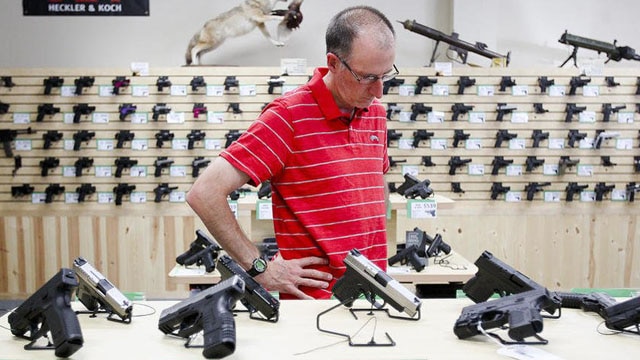 The gun industry's lingering "malaise" will keep prices low for buyers, analysts suggest. (Photo: Sarah Nader/Northwest Herald)