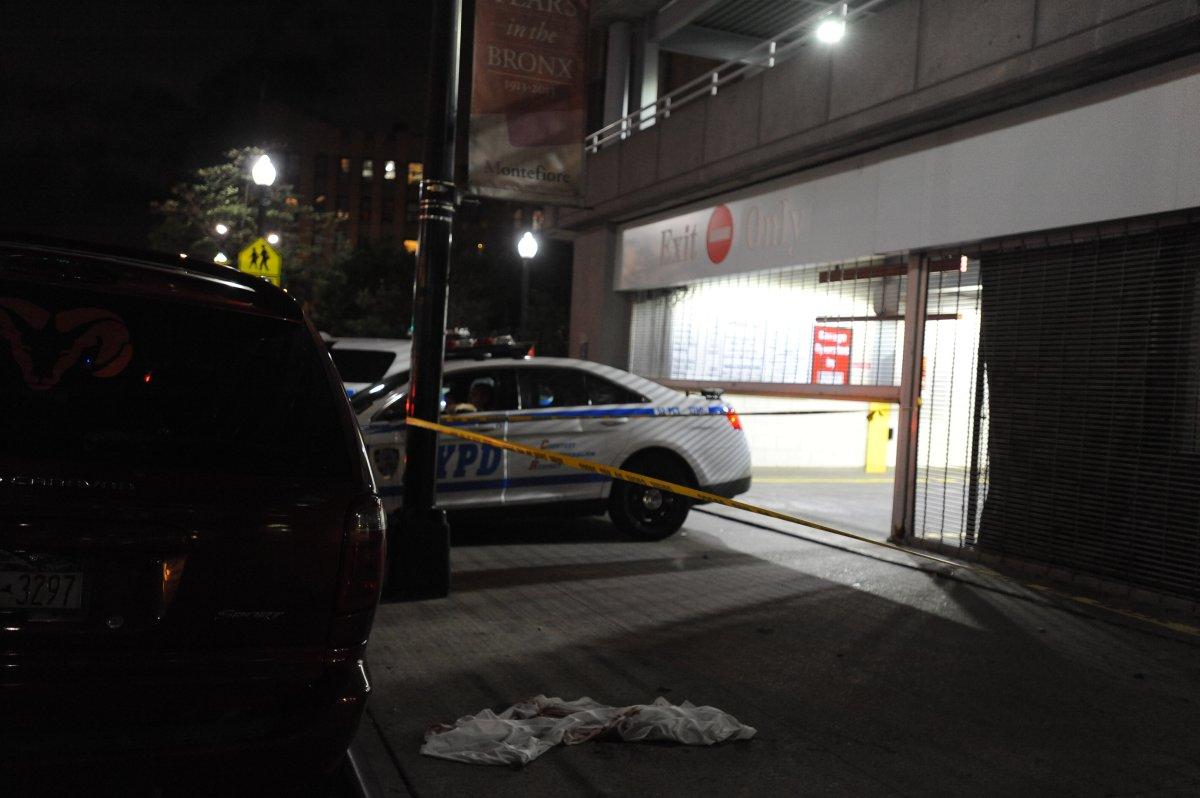 Police at the scene where a doctor jumped to his death Friday. (Photo: New York Daily News)
