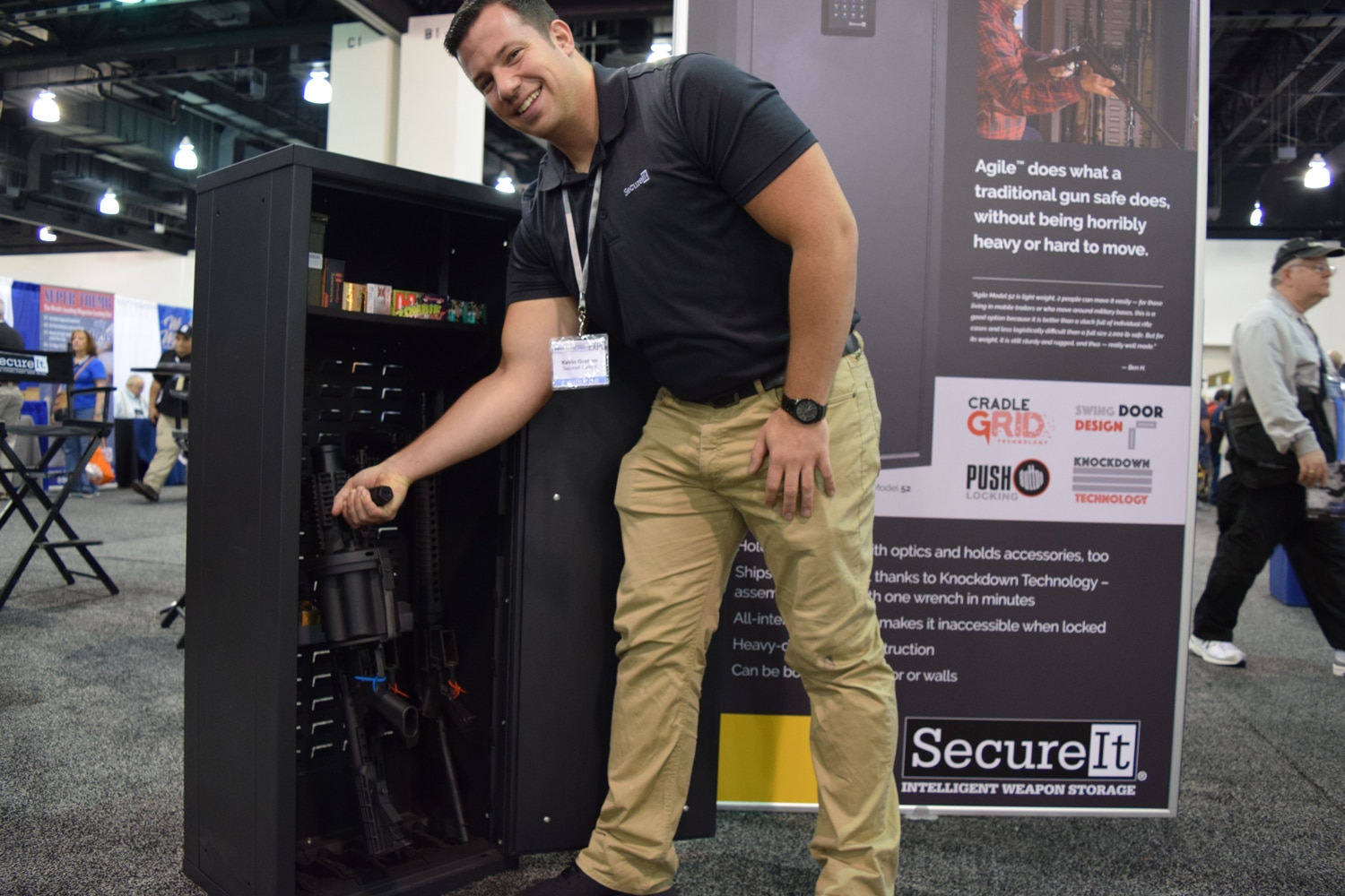 Kevin Graham, marketing coordinator for Secure It, stows his everyday carry in an intelligent firearm storage safe. (Photo: Daniel Terrill/Guns.com)